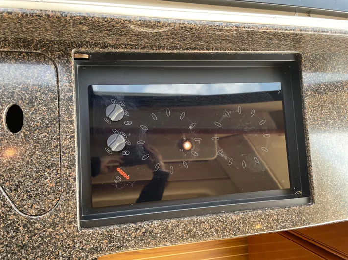 Remembrance Yacht Photos Pics Control panel on a 2006 Meridian 411 Sedan boat, featuring dials and a sleek design.