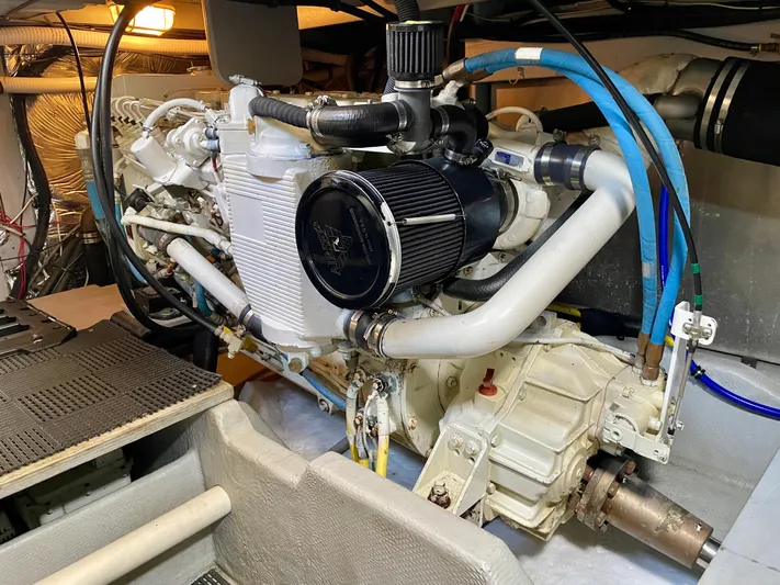 Remembrance Yacht Photos Pics Engine room of a 2006 Meridian 411 Sedan yacht, showcasing detailed mechanical components.