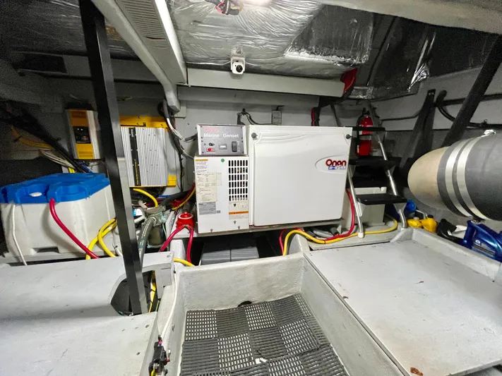 Remembrance Yacht Photos Pics Engine room of 2006 Meridian 411 Sedan with Onan marine generator and wiring.