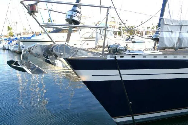 Majestic Yacht Photos Pics 2006 Tayana 58 Deck Salon yacht docked in marina, featuring sleek design and modern equipment.