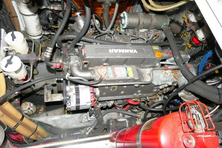 Majestic Yacht Photos Pics Engine room of 2006 Tayana 58 Deck Salon yacht with visible Yanmar engine components.