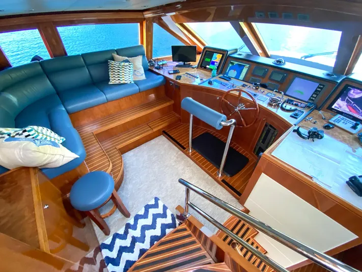 Cynderella Yacht Photos Pics Luxurious 2010 Hargrave Custom Raised Pilothouse interior with modern navigation equipment and plush seating.