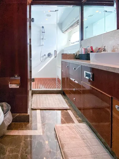Cynderella Yacht Photos Pics Luxurious bathroom in 2010 Hargrave Custom Raised Pilothouse yacht with modern fixtures and elegant design.