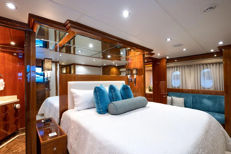 Cynderella Yacht Photos Pics Luxurious bedroom interior of 2010 Hargrave Custom Raised Pilothouse yacht with elegant decor.