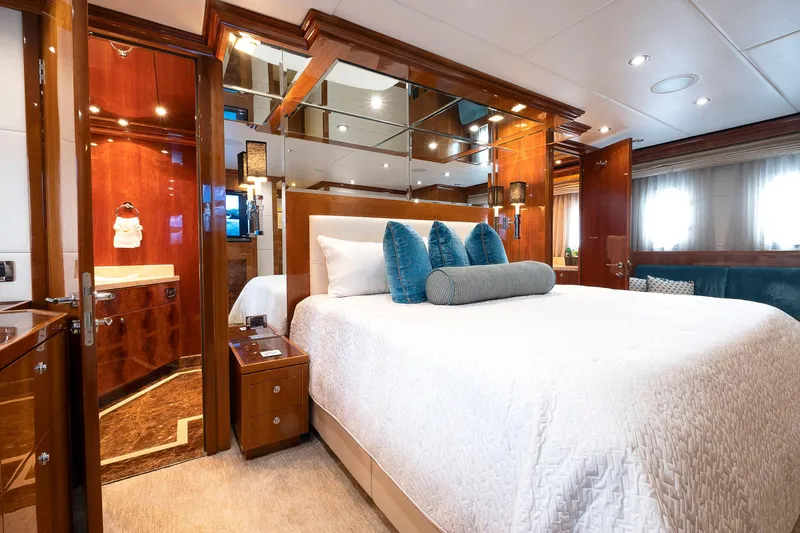 Cynderella Yacht Photos Pics Luxurious bedroom in 2010 Hargrave Custom Raised Pilothouse yacht with elegant wood finishes.