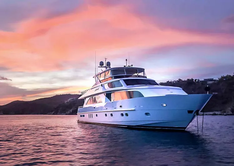 Cynderella Yacht Photos Pics Luxurious 2010 Hargrave Custom Raised Pilothouse yacht at sunset on tranquil waters.