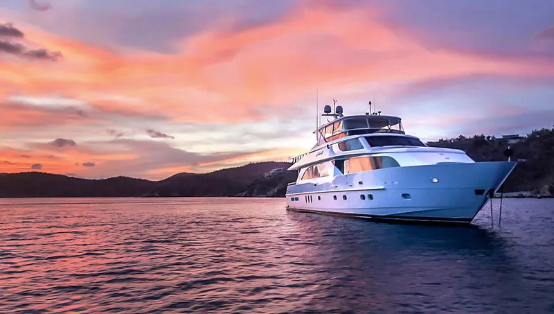 Cynderella Yacht Photos Pics Luxurious 2010 Hargrave Custom Raised Pilothouse yacht at sunset on tranquil waters.