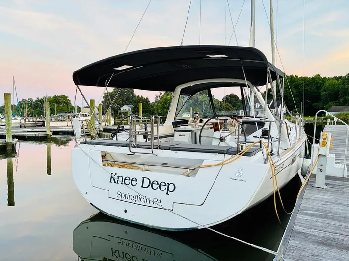  Yacht Photos Pics 2017 Beneteau Oceanis 45 sailboat docked at a marina, named "Knee Deep."