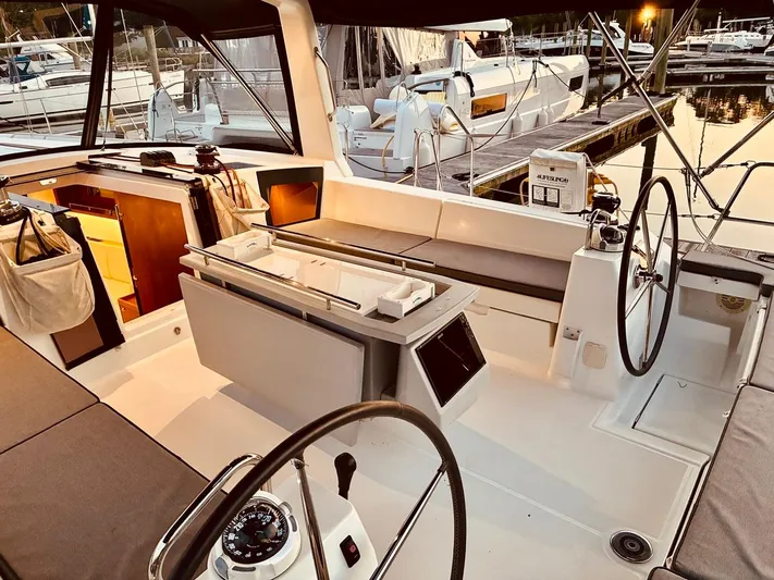  Yacht Photos Pics 2017 Beneteau Oceanis 45 yacht cockpit with dual steering wheels and modern design.