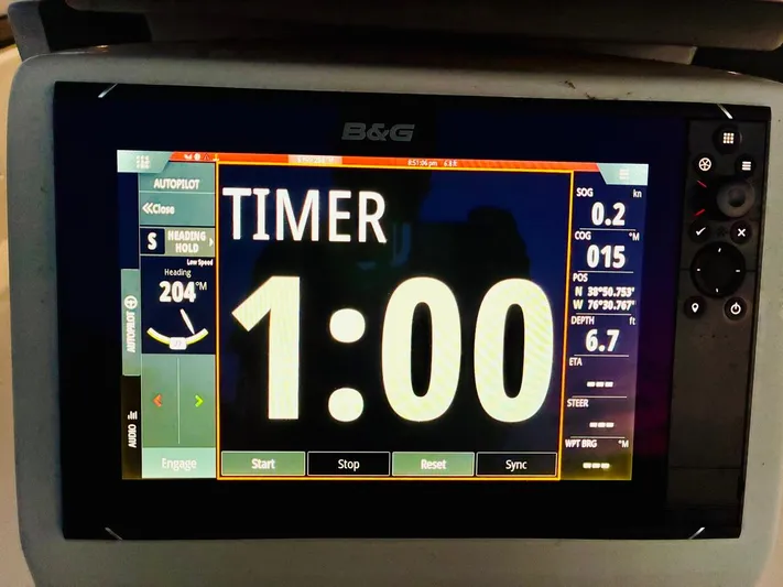  Yacht Photos Pics B&G navigation display on 2017 Beneteau Oceanis 45, showing timer and sailing data.