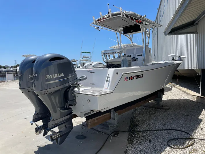  Yacht Photos Pics 2022 Contender 25 Tournament boat with Yamaha engines, docked outdoors.