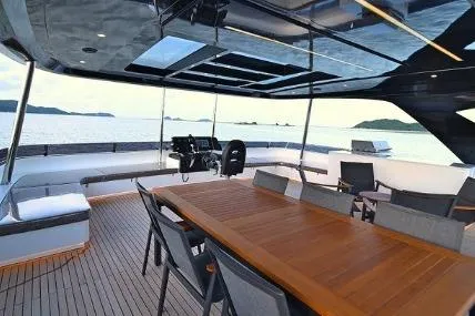 Evita Yacht Photos Pics Luxurious 2025 Custom NAUTICKS 62 yacht with spacious deck and elegant seating area.