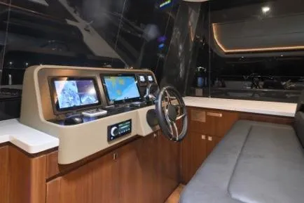 Evita Yacht Photos Pics Helm station of 2025 Custom NAUTICKS 62 yacht with modern navigation equipment.