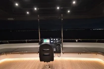 Evita Yacht Photos Pics Custom NAUTICKS 62 yacht helm at night, 2025 model, with illuminated controls and seating.