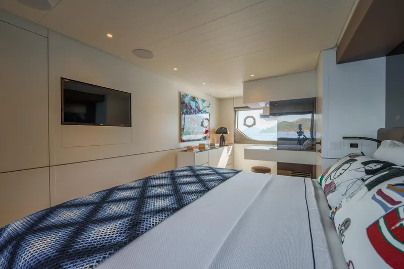 Mama Punch Yacht Photos Pics Luxurious interior of 2021 Bluegame BGX70 yacht with modern decor and large windows.
