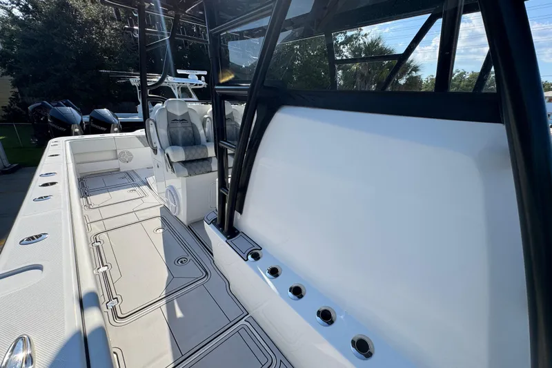  Yacht Photos Pics 2023 Invincible 35 Catamaran interior with sleek seating and modern design features.