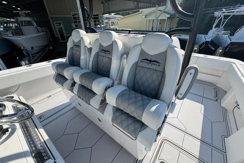  Yacht Photos Pics 2023 Invincible 35 Catamaran interior with luxurious seating and modern design.