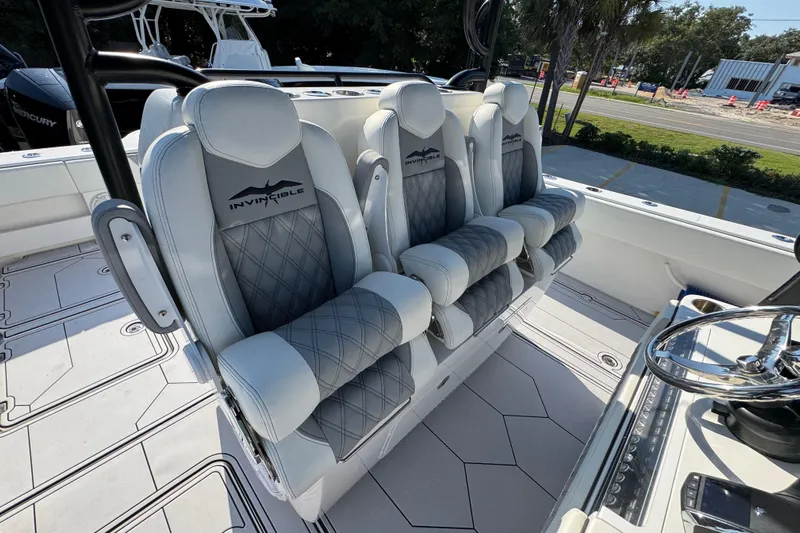  Yacht Photos Pics Luxurious seating on 2023 Invincible 35 Catamaran, featuring sleek design and premium materials.