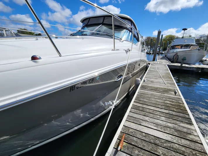  Yacht Photos Pics 2006 Sea Ray 38 Sundancer docked at marina under blue sky.