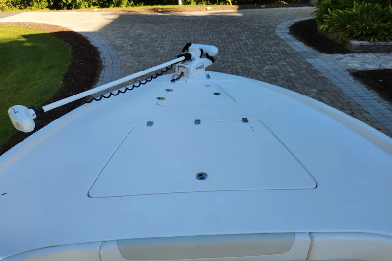  Yacht Photos Pics 2020 Caymas 28 HB boat bow with trolling motor on paved driveway.