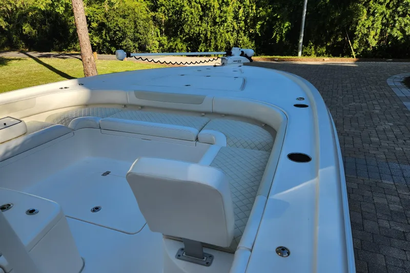  Yacht Photos Pics 2020 Caymas 28 HB boat interior with white seating and spacious deck.