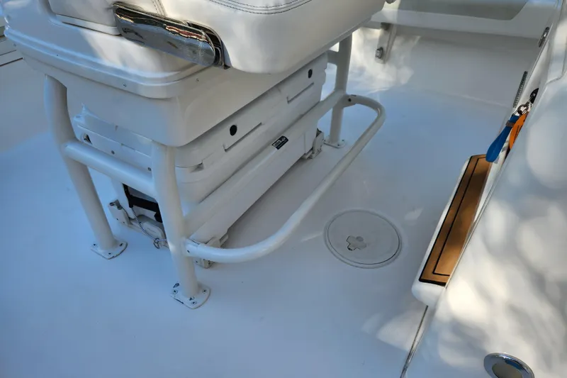  Yacht Photos Pics 2020 Caymas 28 HB boat interior with seating and storage area.