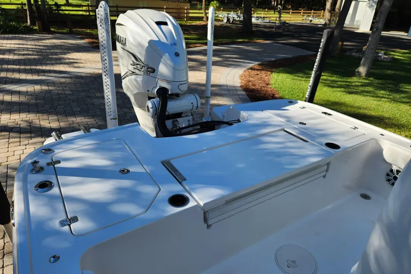  Yacht Photos Pics 2020 Caymas 28 HB boat with Yamaha engine, docked on a sunny day.