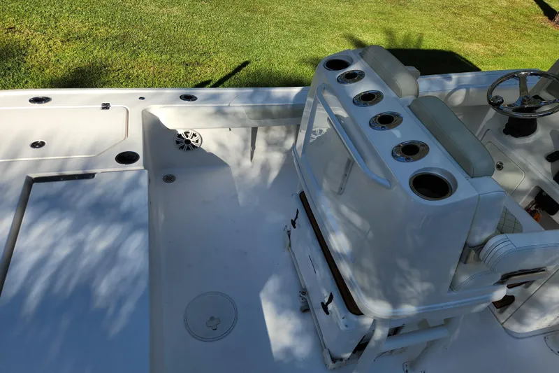  Yacht Photos Pics 2020 Caymas 28 HB boat interior with seating and steering wheel.