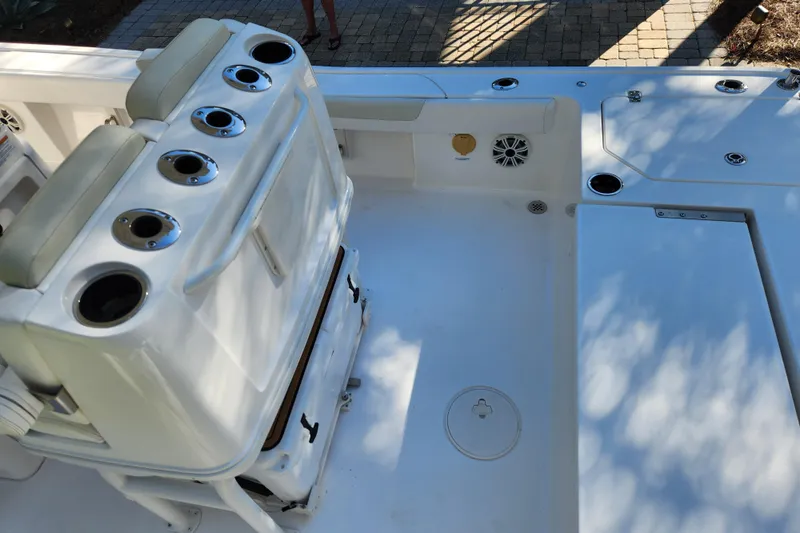  Yacht Photos Pics 2020 Caymas 28 HB boat interior with seating and cup holders.