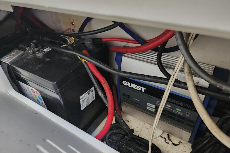  Yacht Photos Pics 2020 Caymas 28 HB boat battery and Guest marine charger with cables.