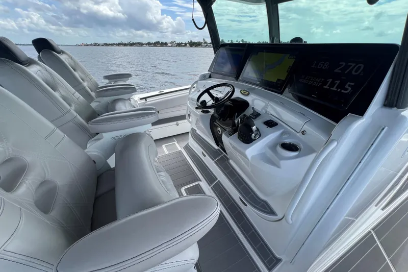 Title Wave Yacht Photos Pics HCB 53 Title Wave - Helm