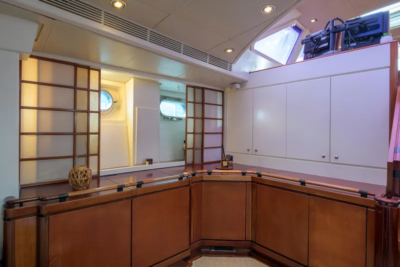 Billy Budd II Yacht Photos Pics Luxurious interior of 1994 Royal Huisman 112' Custom yacht with elegant wood paneling.