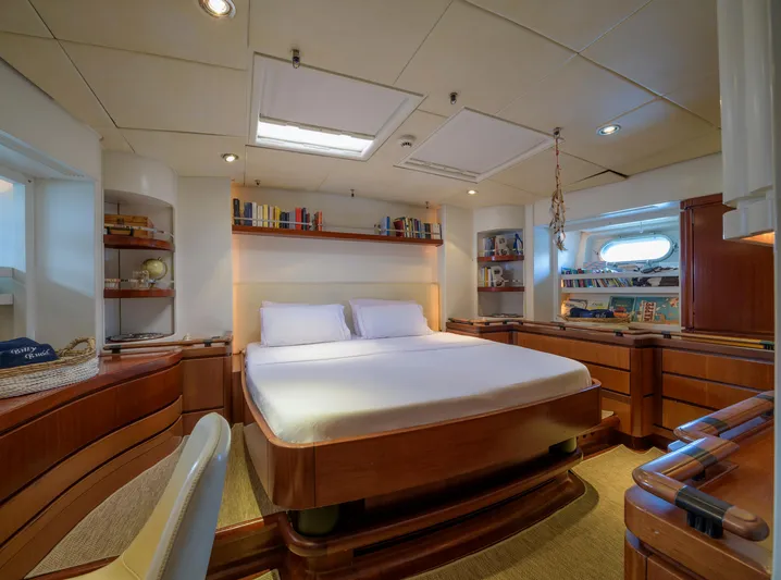 Billy Budd II Yacht Photos Pics Luxurious cabin interior of 1994 Royal Huisman 112' Custom yacht with elegant wood finishes.