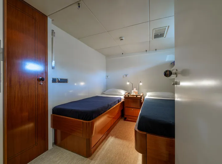 Billy Budd II Yacht Photos Pics Twin cabin with wooden furnishings on a 1994 Royal Huisman 112' Custom yacht.