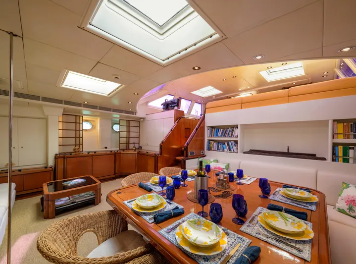 Billy Budd II Yacht Photos Pics Luxurious dining area on 1994 Royal Huisman 112' Custom yacht with elegant table setting.