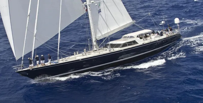 Billy Budd II Yacht Photos Pics Sailing yacht Royal Huisman 112' Custom 1994 navigating ocean waters.