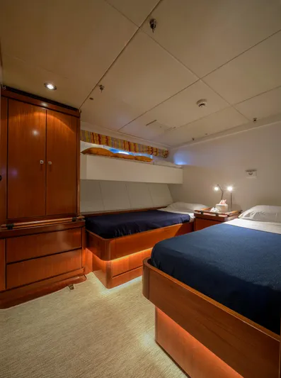 Billy Budd II Yacht Photos Pics Luxurious cabin interior of 1994 Royal Huisman 112' Custom yacht with twin beds.