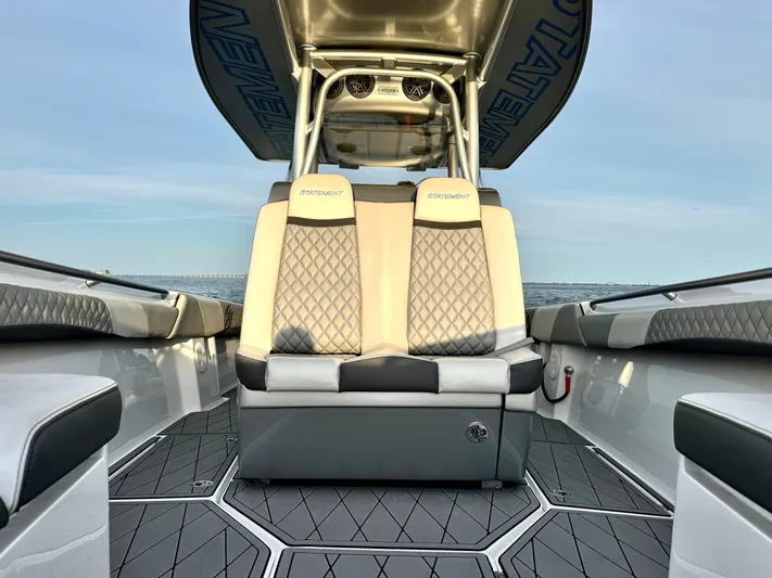  Yacht Photos Pics Luxury seating on 2019 Statement 350 Open boat, featuring diamond-stitched upholstery and sleek design.