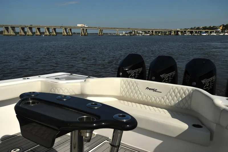  Yacht Photos Pics 2022 Front Runner 39 Center Console boat with four powerful engines on a calm waterway.