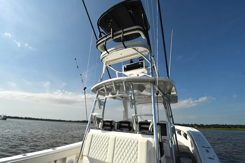  Yacht Photos Pics 2022 Front Runner 39 Center Console boat on calm water under clear blue sky.