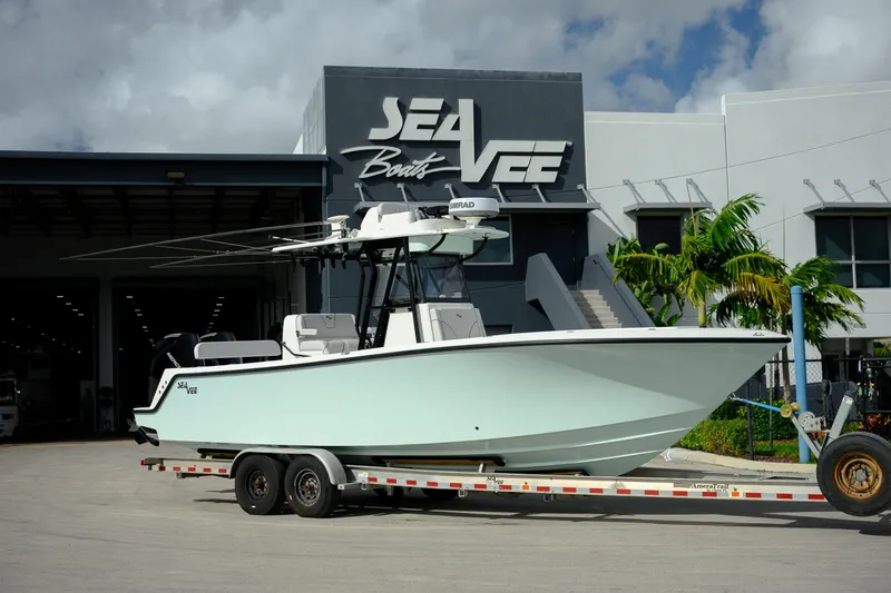 Seavee Yacht Photos Pics 2023 SeaVee 290B boat on trailer outside SeaVee Boats facility.