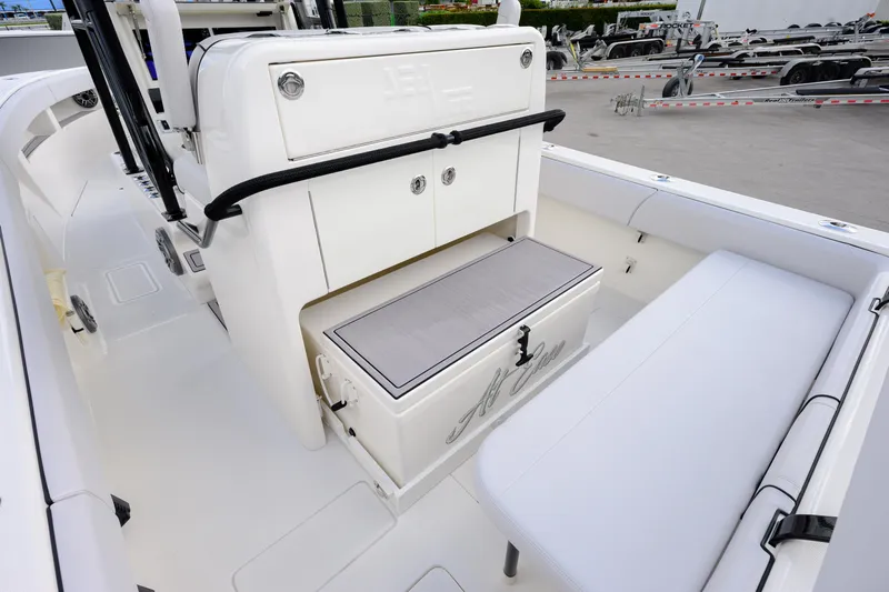 Seavee Yacht Photos Pics 2023 SeaVee 290B boat interior with seating and storage compartments.