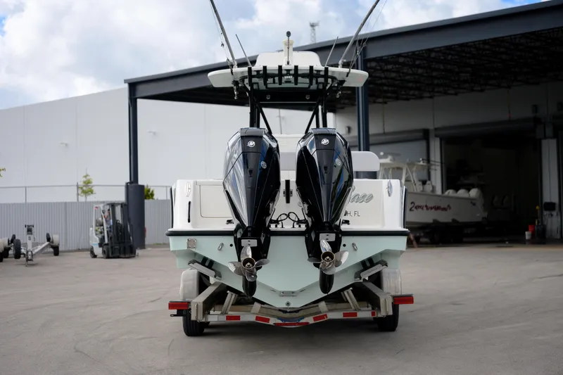 Seavee Yacht Photos Pics 2023 SeaVee 290B boat with dual outboard motors on a trailer.