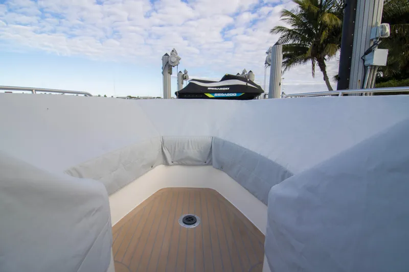  Yacht Photos Pics 2025 MJM 38 X boat interior with cushioned seating and wooden flooring.