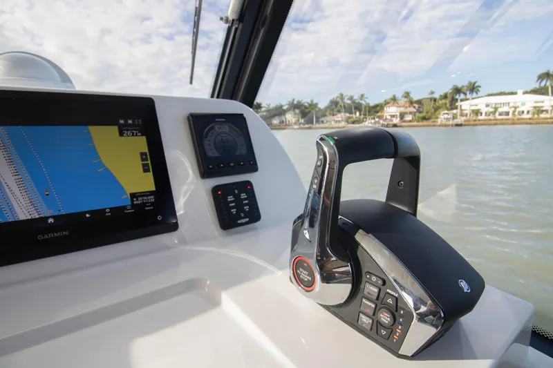  Yacht Photos Pics Helm of 2025 MJM 38 X with Garmin navigation and throttle controls.