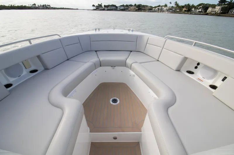  Yacht Photos Pics Spacious seating area on 2025 MJM 38 X boat, featuring elegant design and waterfront view.