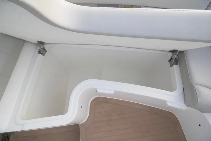  Yacht Photos Pics Storage compartment on 2025 MJM 38 X boat with cushioned seating.
