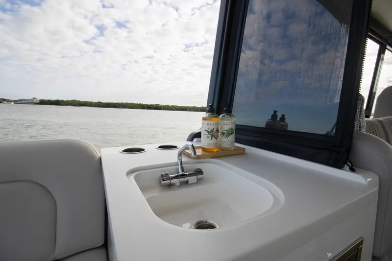  Yacht Photos Pics Luxury sink area on 2025 MJM 38 X boat with scenic water view.