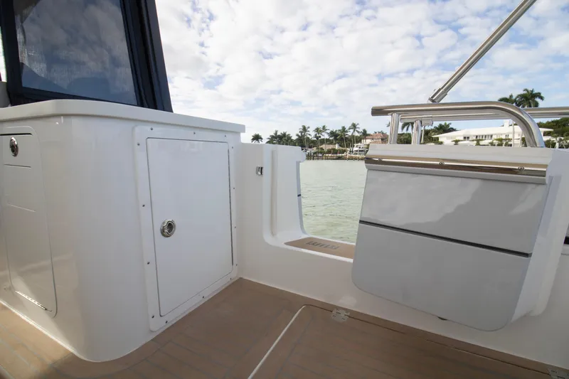 Yacht Photos Pics 2025 MJM 38 X boat deck with sleek design and waterfront view.
