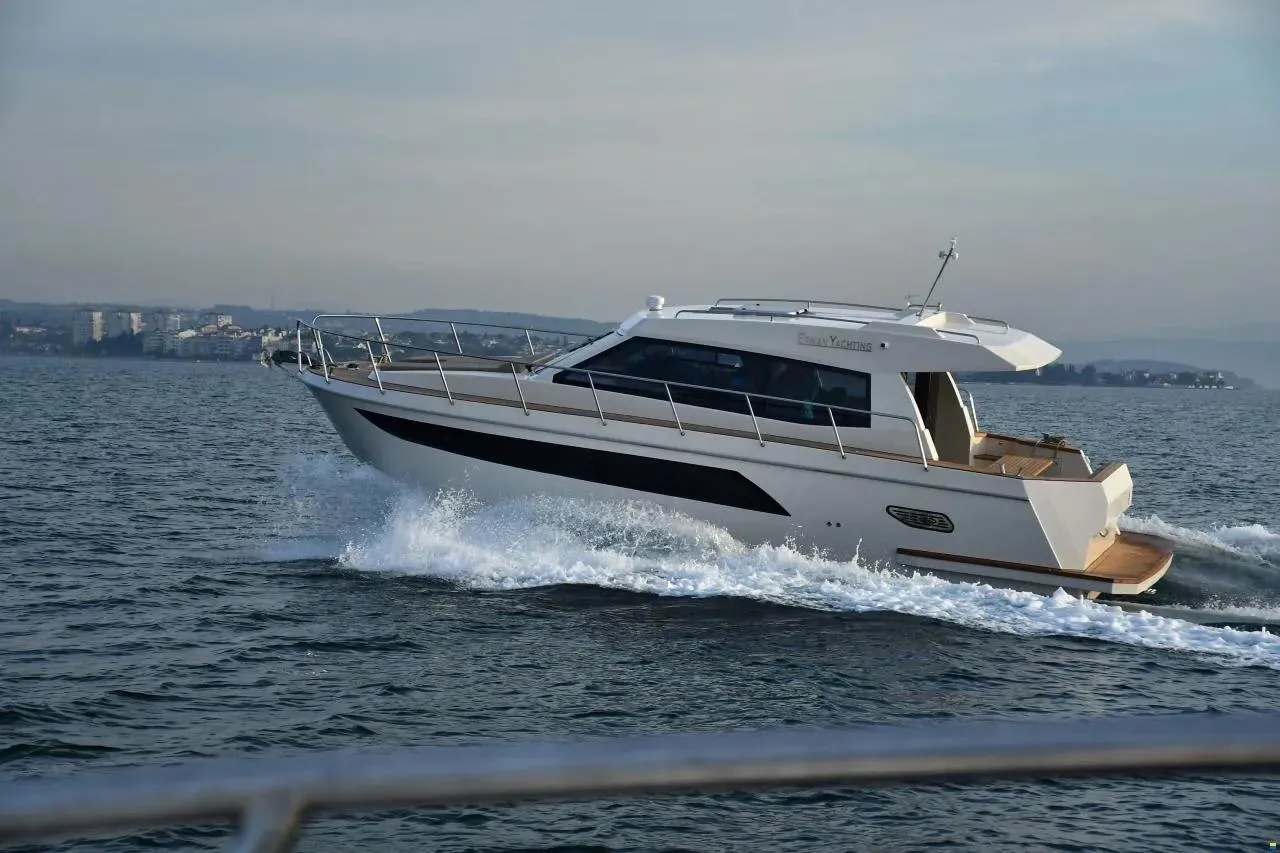 ERMAN YACHTING Comfort 36 cruising on open water, showcasing sleek design and performance.